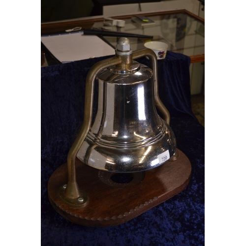 720 - A Mid-C20 Fire Engine Bell, with chrome finish on brass frame, mounted on wooden stand. Bell D25.5cm... 