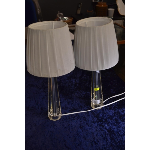 725 - Pair of crystal based bedside lamps and shades. 