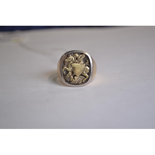 762 - 18ct gold signet ring, set to the top with St. George defeating the dragon, size V, 18.85 grams