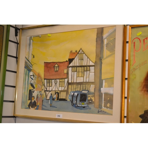 514 - Framed water colour of a town scene, signed bottom right.