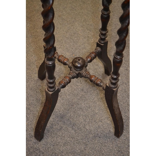 1128 - Oak barley twist jardinière stand, with cross stretcher support. Height 104cm x diameter 35cm... 