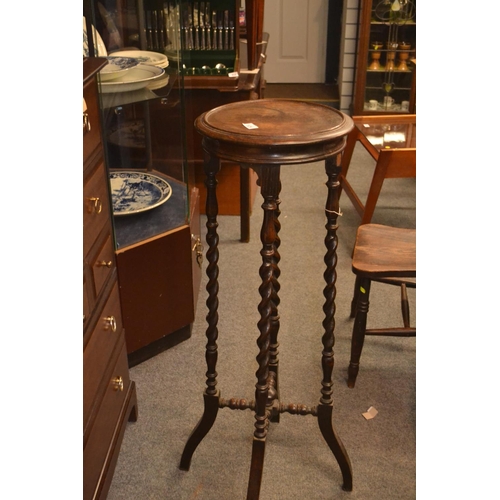 1128 - Oak barley twist jardinière stand, with cross stretcher support. Height 104cm x diameter 35cm... 