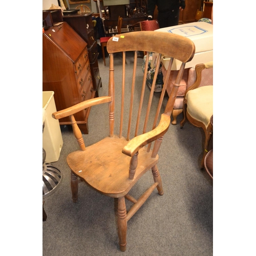 1144 - Elm seated stick back farmhouse carver chair. w 55 x d 62 h 101 cm( seat ht 40cm)