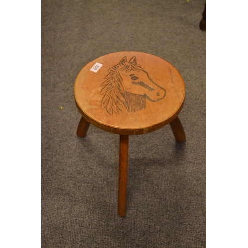 1147 - Three legged stool with carved horse head to seat dia 35.5 h 33.5cm