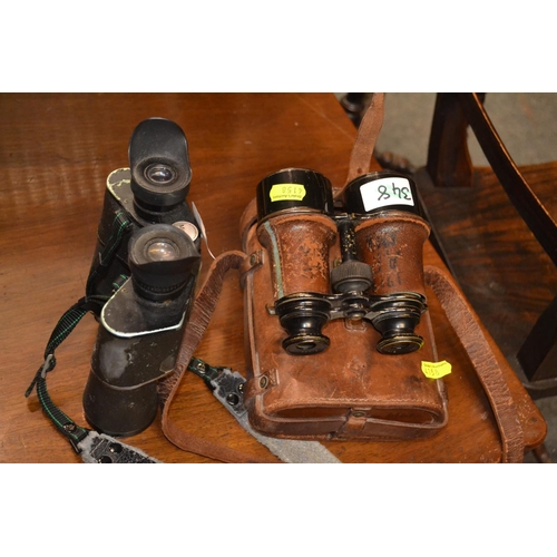 961 - Two pairs of binoculars, one Lacombe, Paris with leather case and one Mirador without case. Lea... 