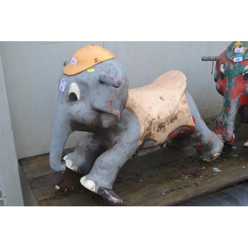 151 - Cast metal Wicksteed Leisure elephant fairground attraction ride seat. L80cm H58cm