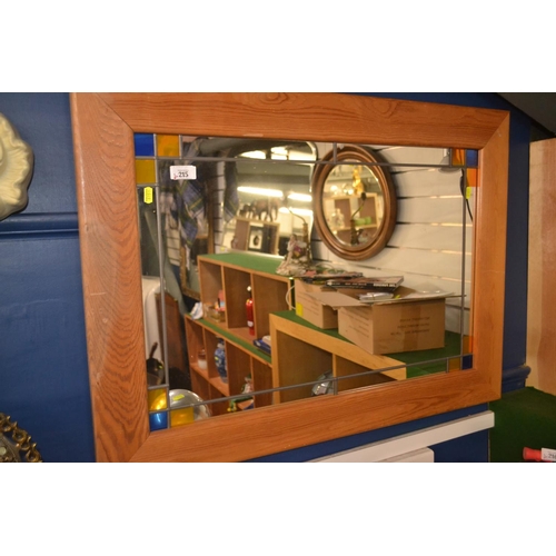 215 - Rectangular pine framed mirror with leaded detail to border. 92.5cm x 67cm.