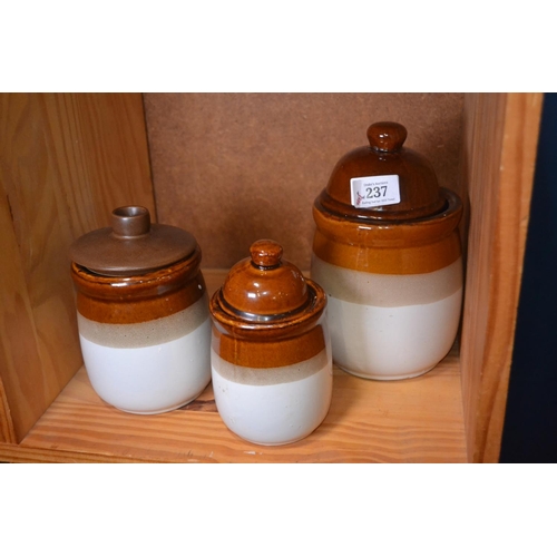 237 - 3 graduated stoneware jars, one with mismatched lid. Tallest 22cm