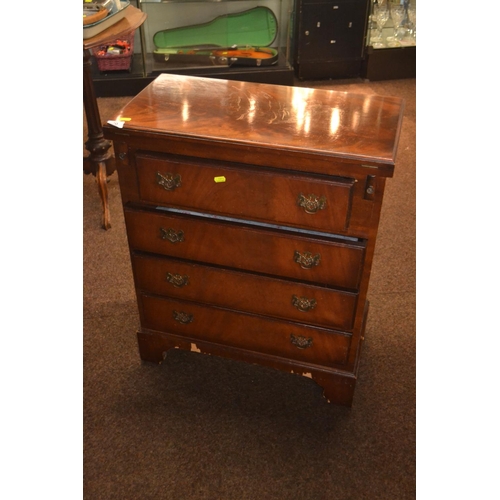 310 - Mahogany coloured 4 drawer chest with folding top to form a table/desk. W 64 X Max depth 66 X H 75cm