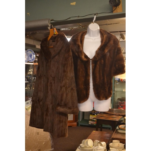 315 - Two ladies furs. One 3/4 length coat and one in shawl style. Unknown if faux or real fur.