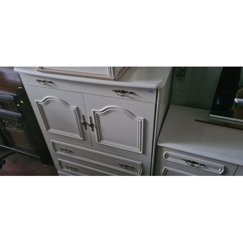 104 - Matching furniture suite including a Three drawer two door tall boy. W95cm D51cmH110cm plus a 9 draw... 