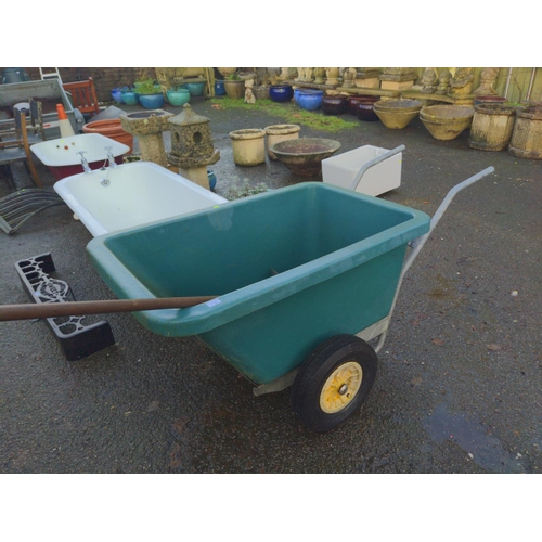 1 - Large green tipping wheelbarrow, with mucking-out stable scrape