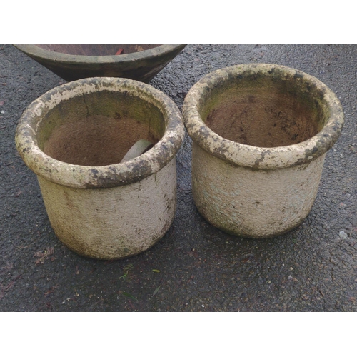 19 - Pair of rim topped concrete circular planters. D44cm H38cm