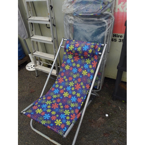 37 - Pair of floral sun loungers