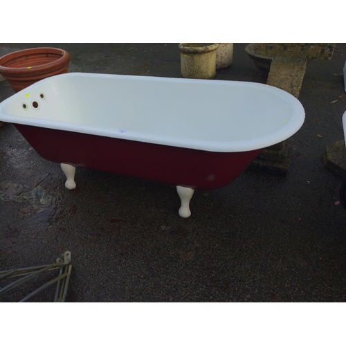 4 - Cast iron enamelled free-standing bathtub, with various brass taps. Red finish. L165cm