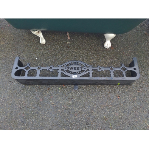 48 - Metal fire surround/trivet. 'Home Sweet Home'. W113cm