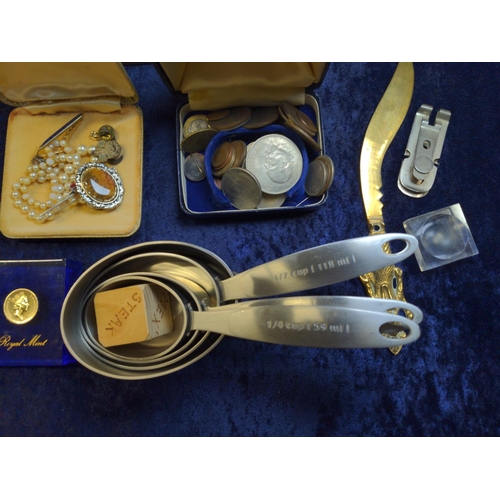 353 - Mixed collectables, including a music box, costume jewellery, badges, coins etc.