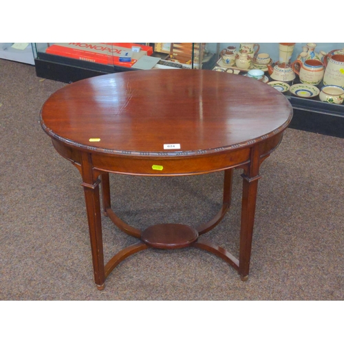 624 - Mahogany occasional table oval in shape with four stylish legs and attractive cross member to base o... 