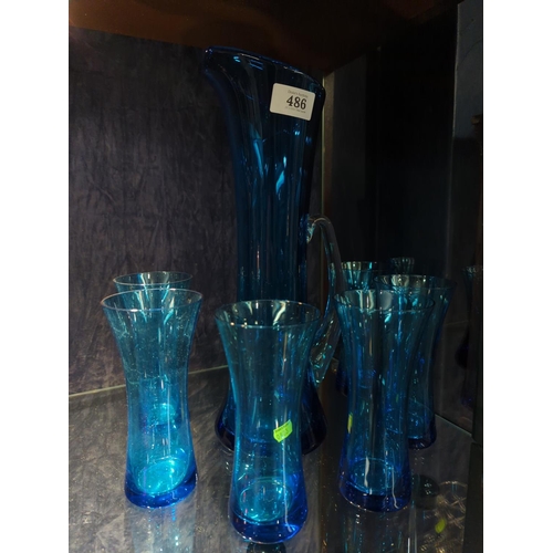 621 - Hand blown kingfisher blue glass elegant jug (35.5cm height) and six glass set. Thought to be Whitef... 