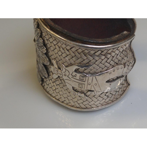 414 - Native American Navajo white metal cuff, the front with applied native American chief flanked by a n... 