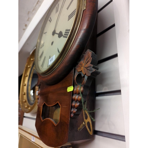 633 - Mahogany wall clock with pendulum & key. H54cm