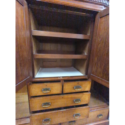 654 - Early C20 large compactum wardrobe, with 2 mirror fronted doors flanking central unit comprised of 2... 