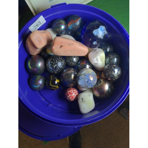 283 - Tub of large marbles & some polished stones, largest 6cm & the smallest 2.3cm