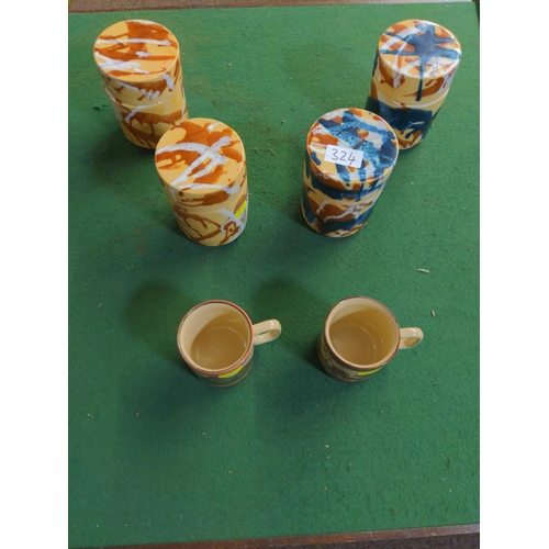 324 - Four containers and two mugs in colourful design Dwala Zimbabwe .
