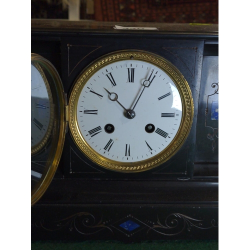 330 - French black marble mantle clock with blue inlay and ceramic dial, pendulum operated. Key wind up .