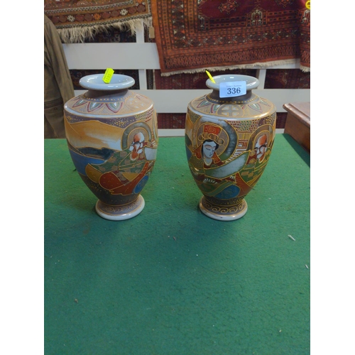 336 - Two Japanese vases hand decorated opposite sided pair.