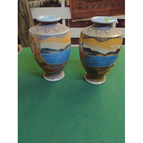 336 - Two Japanese vases hand decorated opposite sided pair.