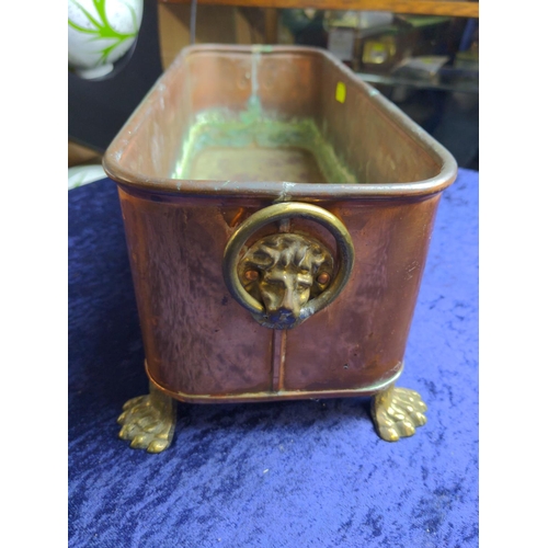 390A - Lombard copper planter with brass lion head mask ring handles & lion paw feet, marked 'Lombard E... 