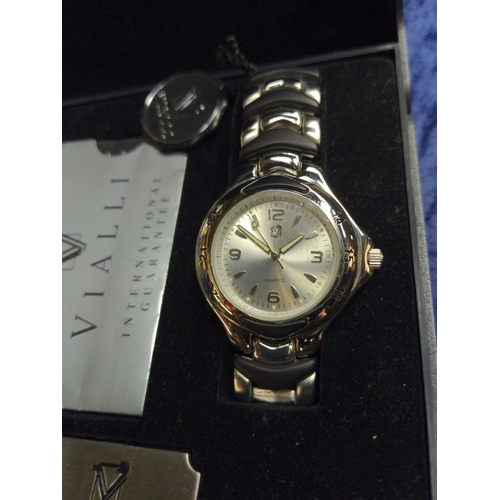 400 - Three quartz wristwatches, including: Calvin Klein model K22331 with box & booklet; Vialli with ... 