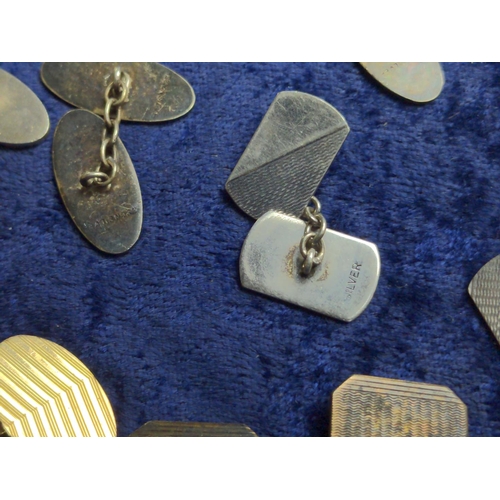 424 - Six pairs of cufflinks, including some silver