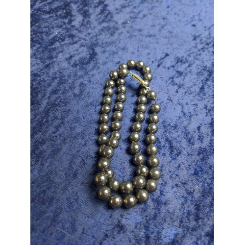 429 - Brass cigarette box with hematite necklace with silver clasp & a seed pearl necklace