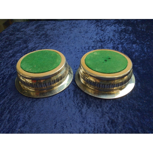 449 - Pair of silver plated wine coasters, diameter 14.5cm