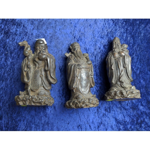 455 - Three moulded Chinese wise men figures, the tallest 18.5cm, & a small mudman figure group