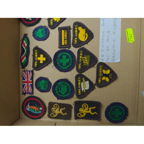 456 - A collection of vintage Girl Guide and Brownie badges, including various activity badges