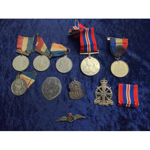 458 - A collection of medals and badges inc. The Khedive's Star 1884, WWI British War Medal (176195 DVR.D.... 