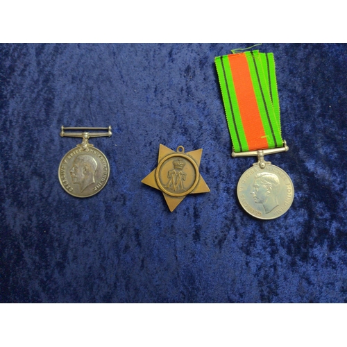 458 - A collection of medals and badges inc. The Khedive's Star 1884, WWI British War Medal (176195 DVR.D.... 