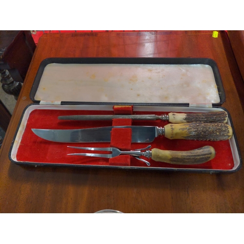 528 - Cased antler handle carving set, Excalibur Sheffield Steel, plus silver plate candelabra.