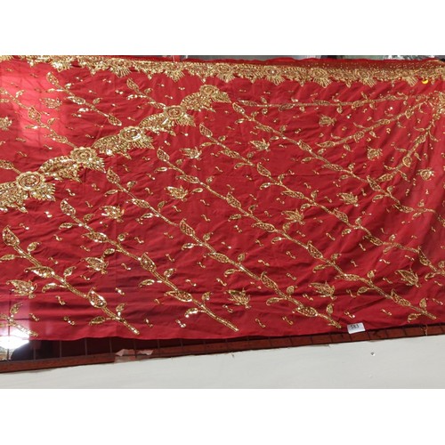 583 - Red fabric & golden emblazoned sari. L5m x 108cm