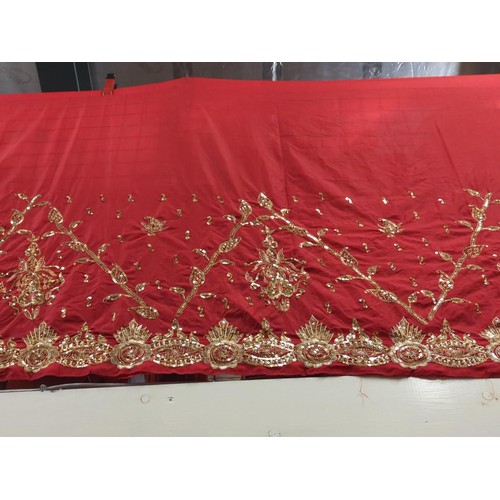 583 - Red fabric & golden emblazoned sari. L5m x 108cm