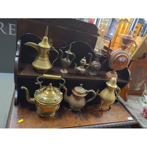 726 - Eight eastern style brass & copper coffee/tea pots