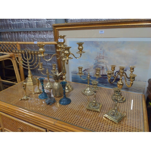 727 - Quantity of brass candles sticks Inc Gorgeous 9 candle Menorah. 