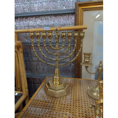 727 - Quantity of brass candles sticks Inc Gorgeous 9 candle Menorah. 