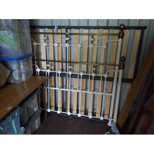 171 - Double sized bed frame in white metal with brass decor.
