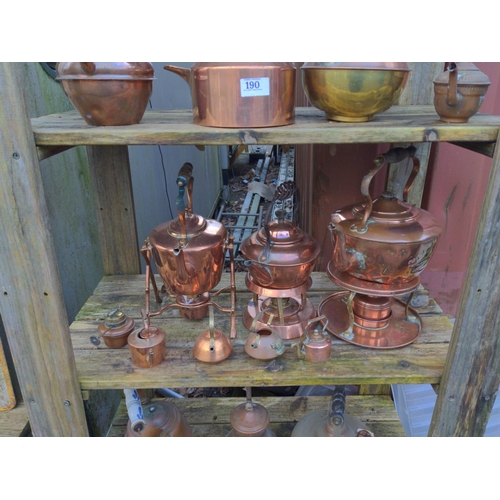 190 - Collection of copper kettles over five shelves