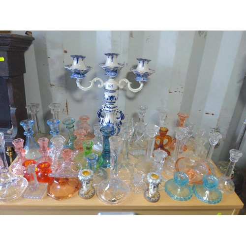 168 - Collection of assorted candlesticks inc, pairs.