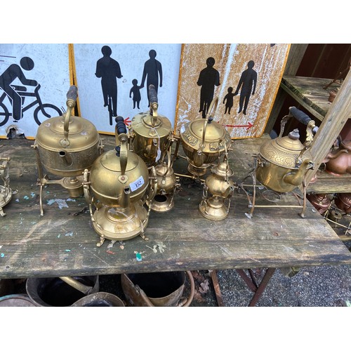 152 - 14 Spirit kettles , twelve brass and 2 silver plate